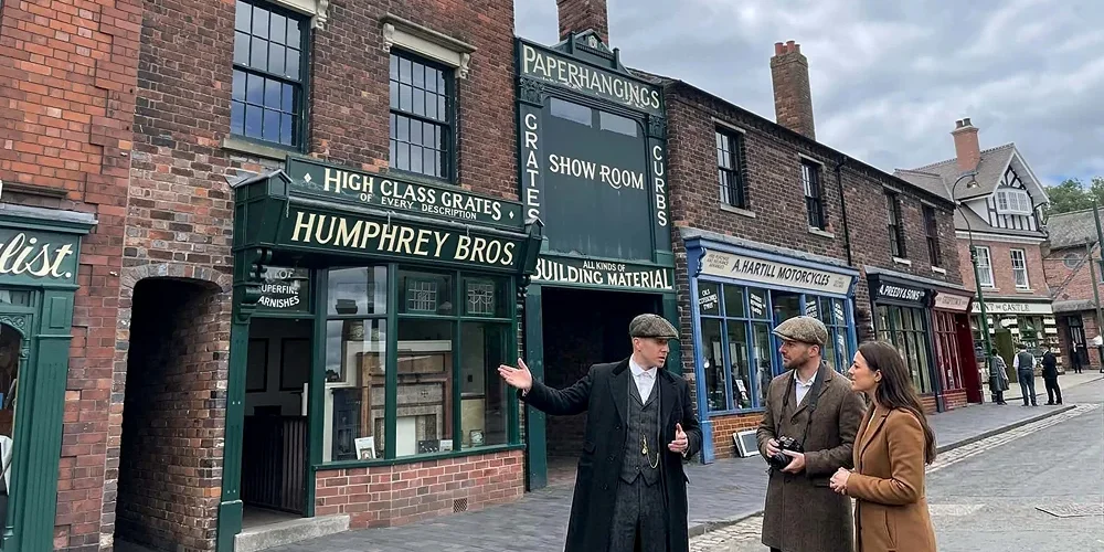 Chauffeur-driven Mercedes parked on a cobbled street at the Black Country Living Museum